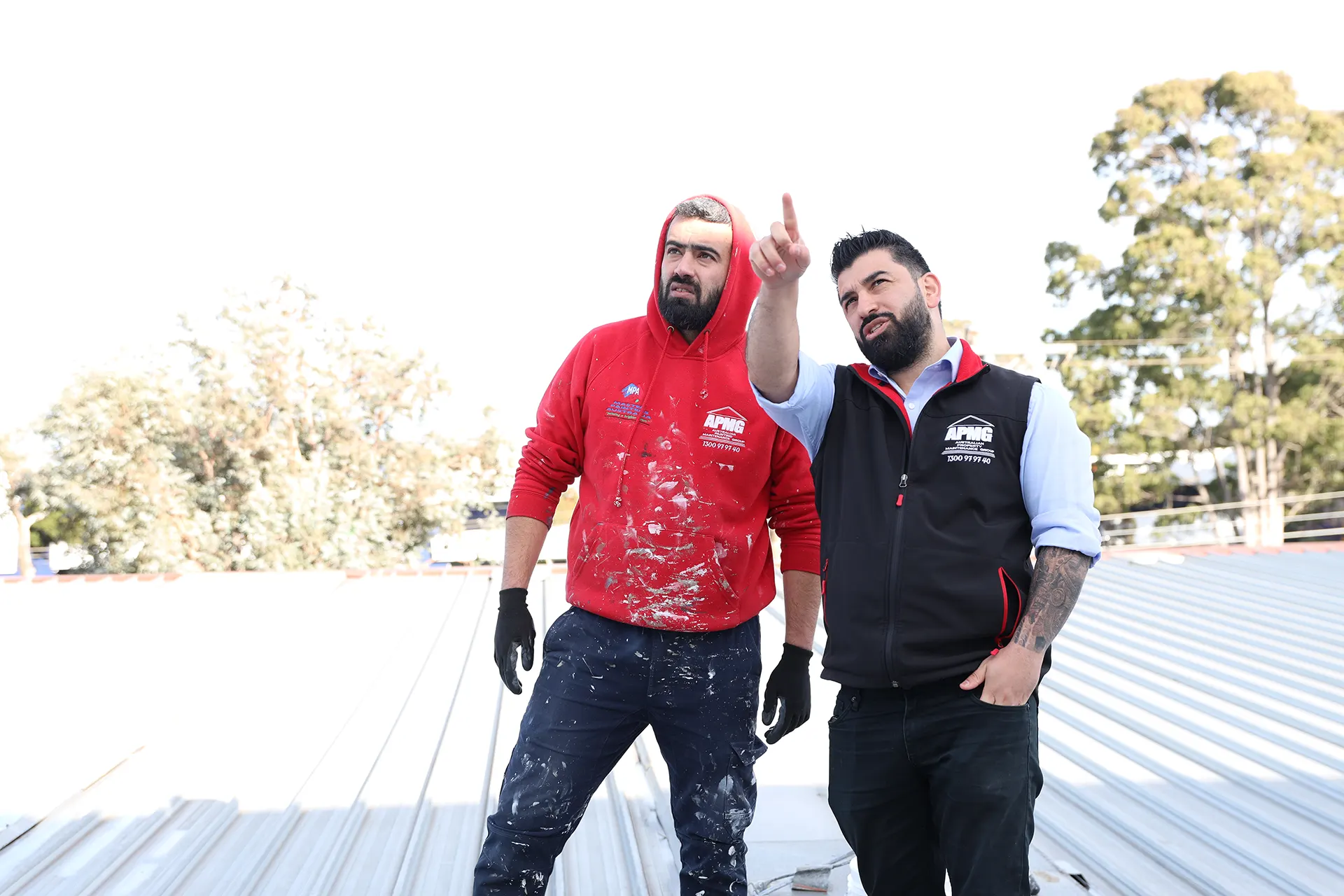 Large-format factory wall repainted using boom lift access in Noble Park